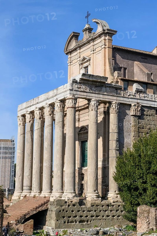 Historic facade of Temple of Pius and Faustina with staircase and ancient columns