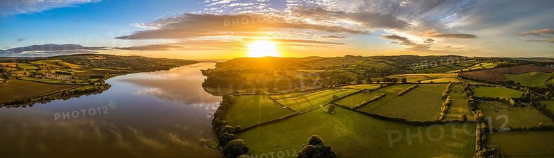 Panorama of Sunrise over Fields and River Teign from a drone