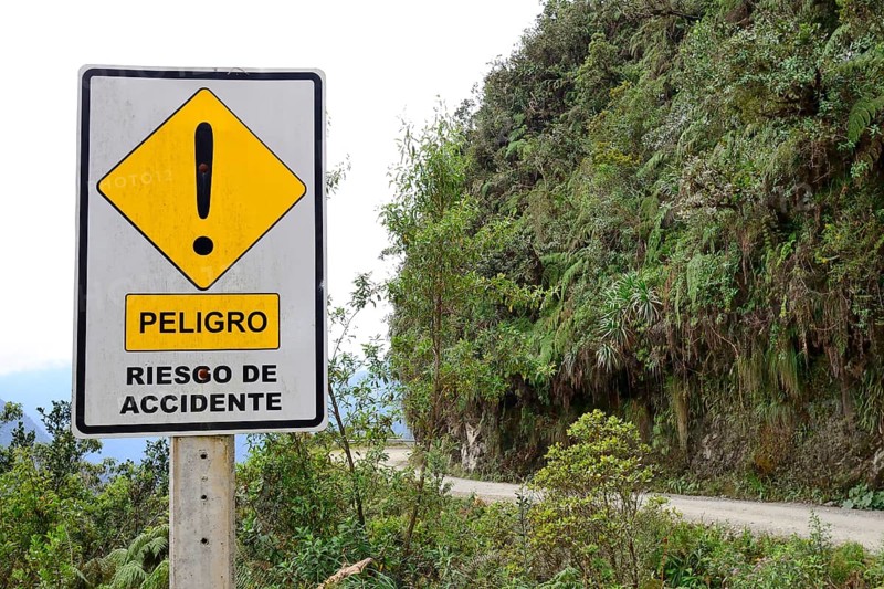 Warning sign on the road of death
