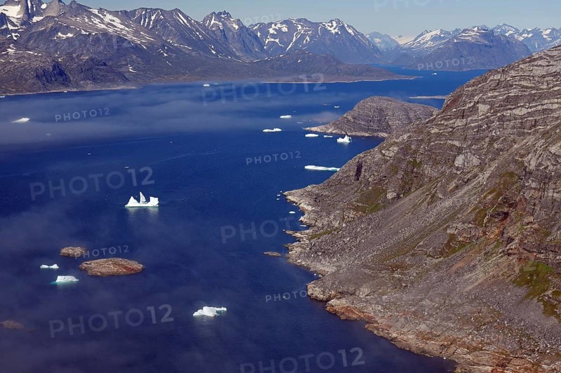 Icebergs and ice in a fjord
