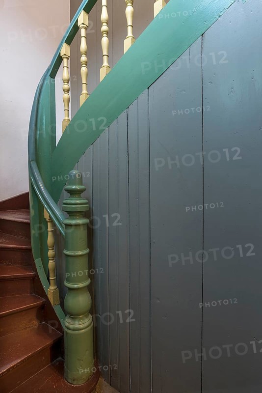 Staircase with banister of the 1920s in a residential house