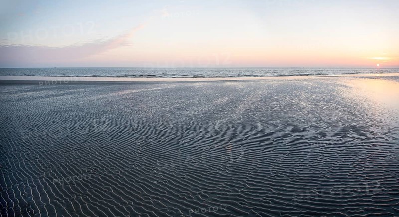 Panorama romantic sunrise in the Wadden Sea