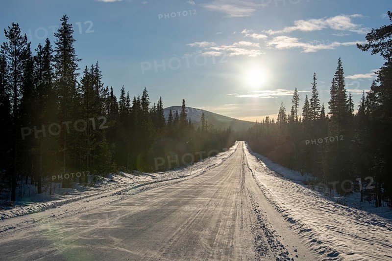 Road to Muonio in the backlight