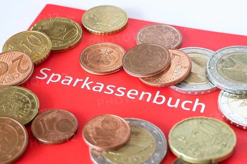 Savings bank book with small change