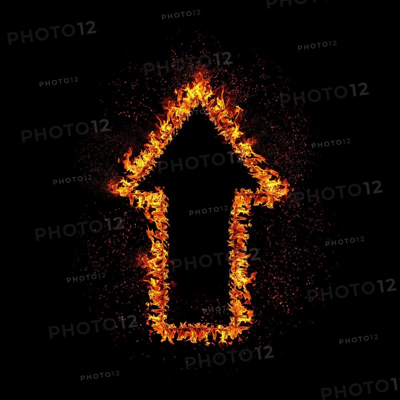 Flaming arrow grow up isolated on black background