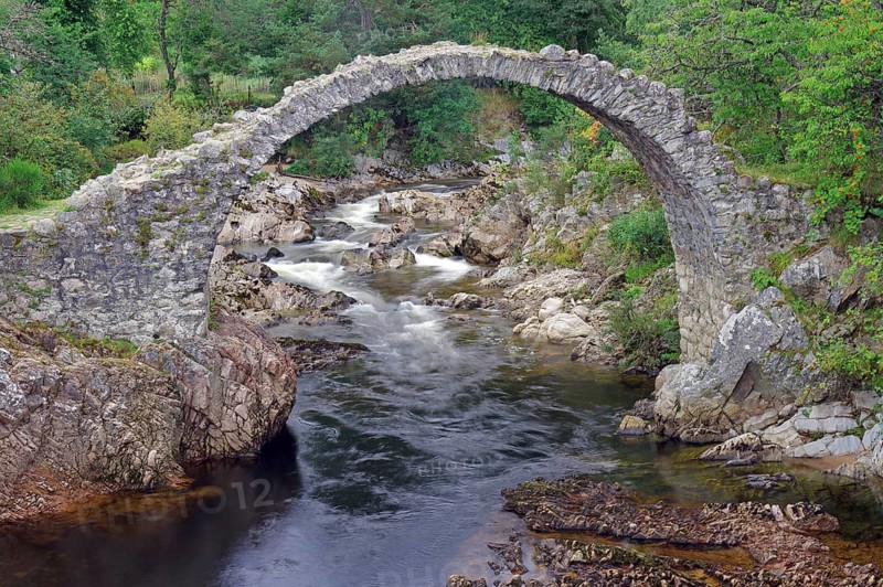 Old curved stone bridge