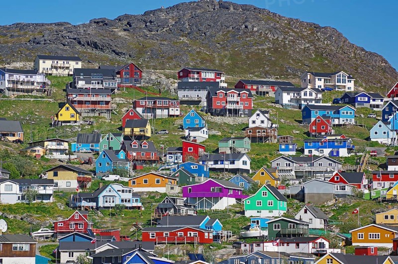 Colourful wooden houses on a mountainside