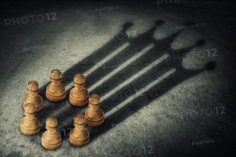 Chess pawn standing together