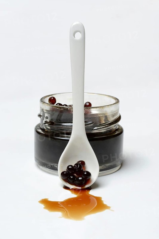 Aceto pearls in glass and spoon