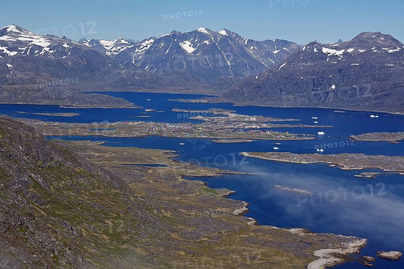 Icebergs and ice in a fjord