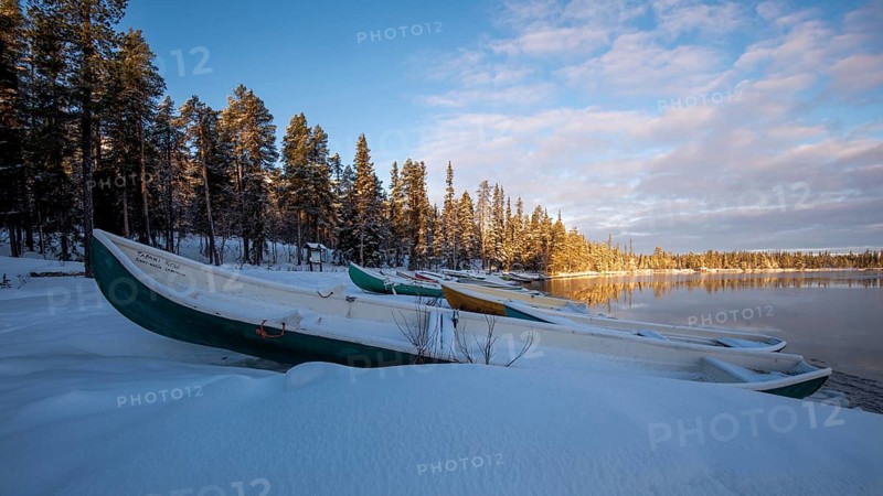 Snowy boats at Saerkijervi