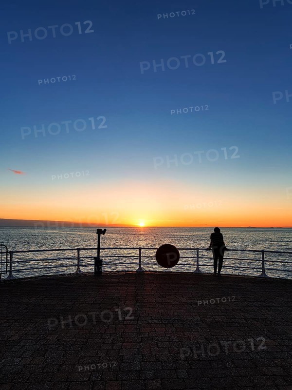 Visitors on Seafront Promenade