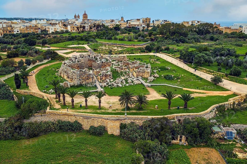 Bird's eye view of historic Neolithic Ggantija temple from temple complex of megalithic culture