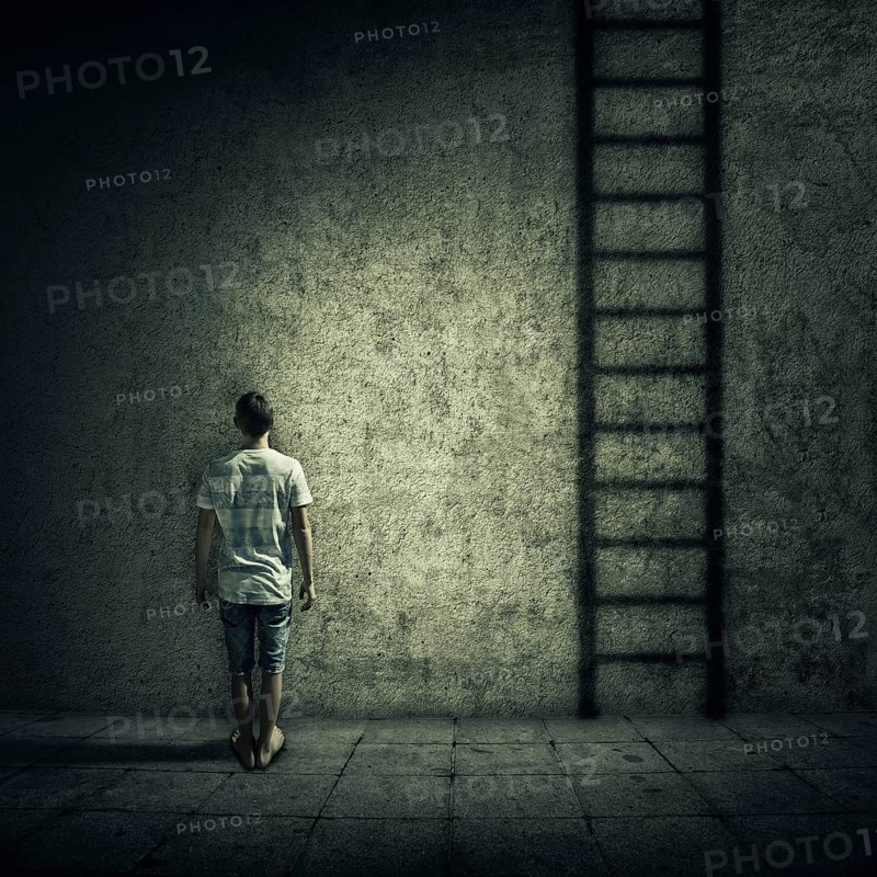 Abstract idea with a person standing in a dark room