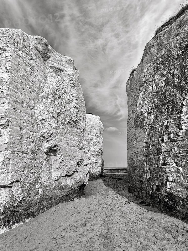 Chalk cliffs with passage to the sea