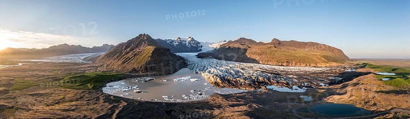 Glacial river in front of Mountains with Hvannadalshnukur