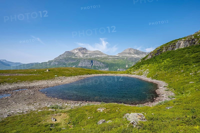 Small mountain lake in Innerdalen high valley
