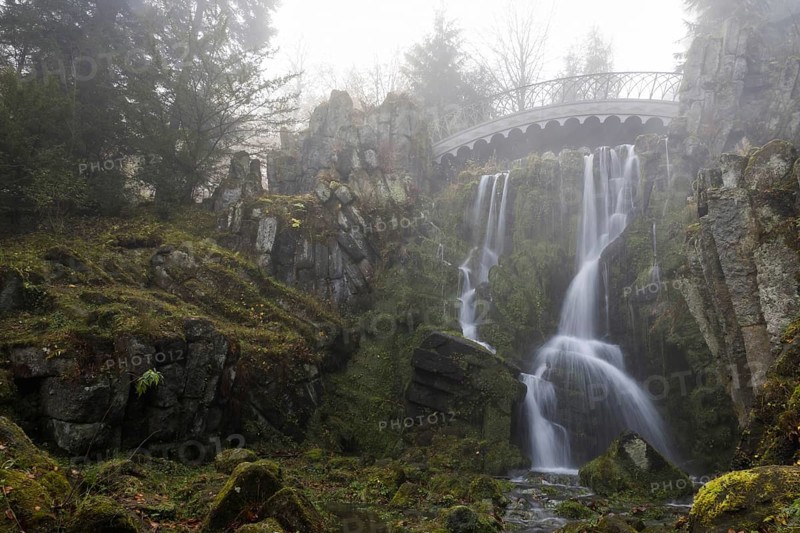 Devil's Bridge with waterfall in autumn