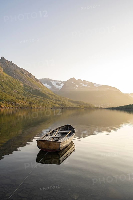 Rowing boat in the backlight