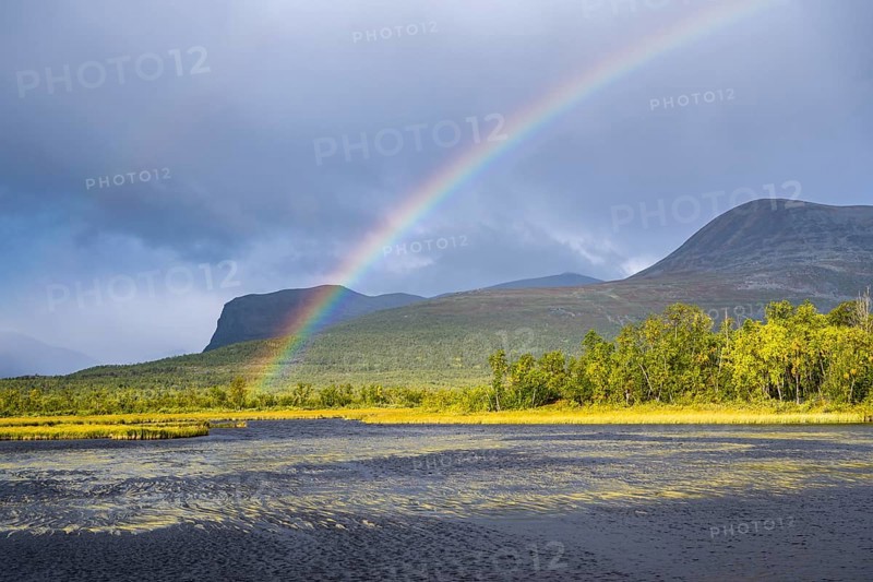 Rainbow in thunderstorm mood