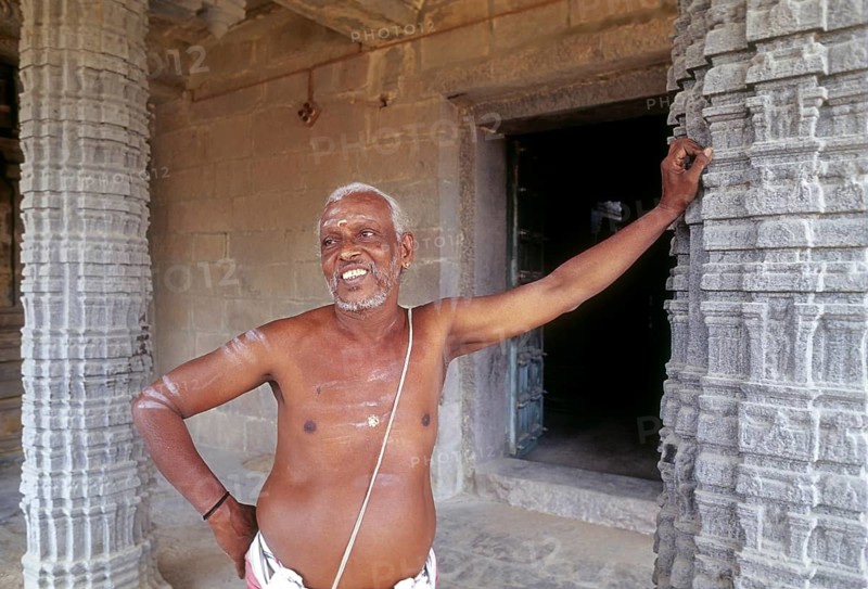 Temple priest standing Kampaheswarar temple in Thirubuvanam near Kumbakonam
