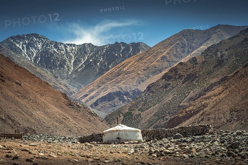 Mongolian nomadic Ger family near the mountain Ikh Bogd. Bayanhongor Province