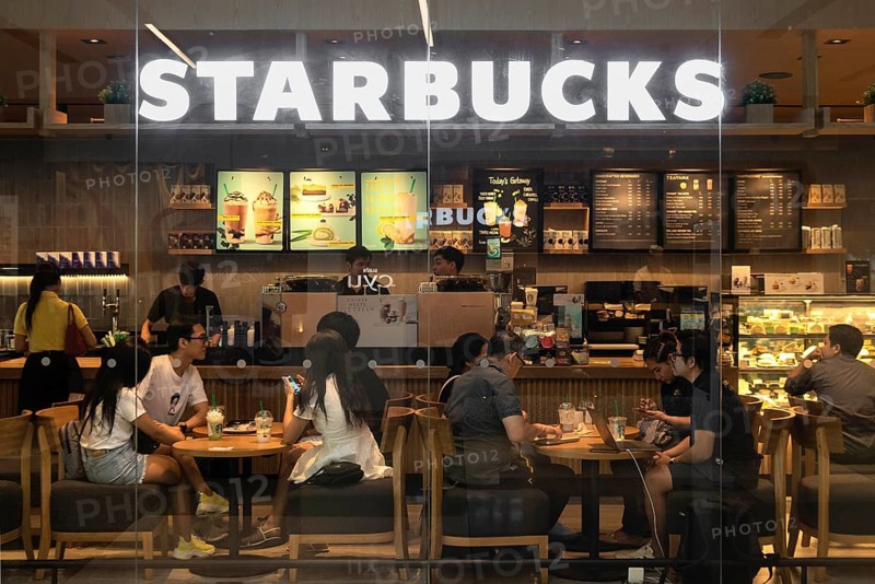 Starbucks shop window illuminated