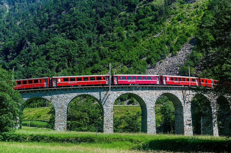 Train crossing the Brusio spiral viaduct