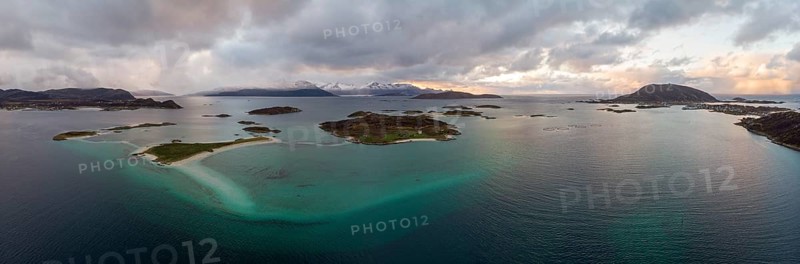 View over the sea with fish farms to Baltsfjorden and the mountains of Balten