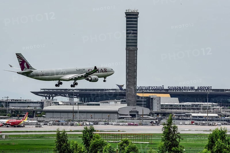 Air traffic control tower Suvarnabhumi Airport and aircraft Qatar Airways Airbus A330-300