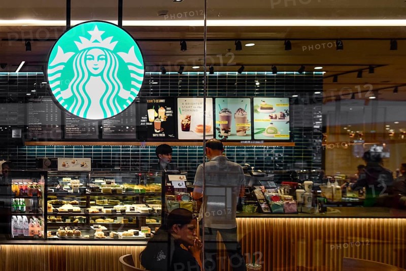 Starbucks shop window illuminated