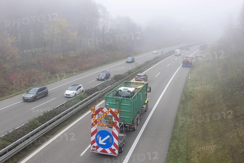 Escort vehicle for protection during mowing work on motorway in autumn