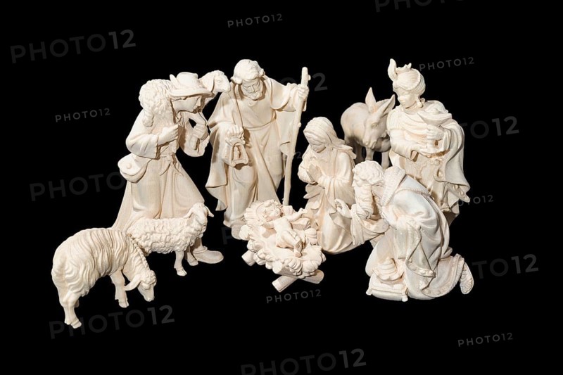 Carved wooden nativity scene figurine
