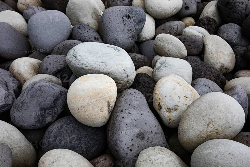 Large round stones on the coast of Rocha da Relva