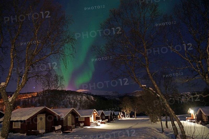 Small cabins in wintry landscape