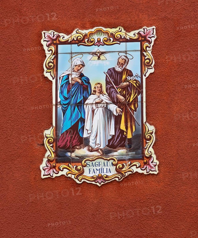 Typical Portuguese tile painting with saint motifs at the house entrances