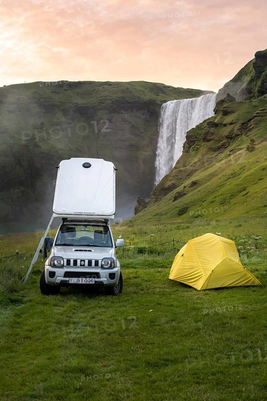 Car with roof tent and tent