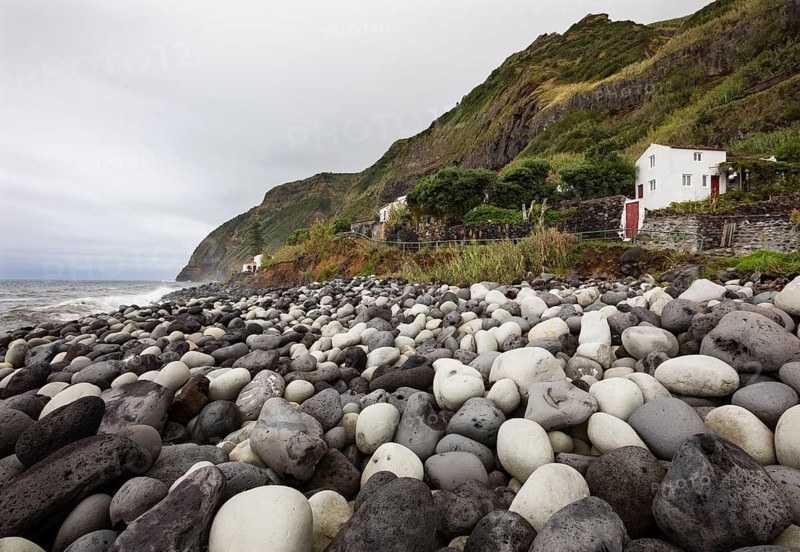 Coast with large round stones in Rocha da Relva
