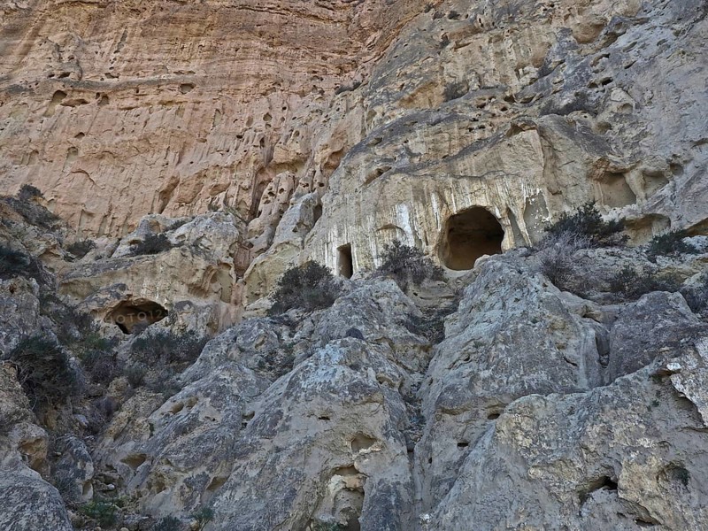 Entrance to cave dwellings in rock face