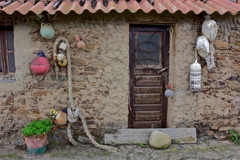 Ropes and buoys as decoration on the wall of a fisherman's house