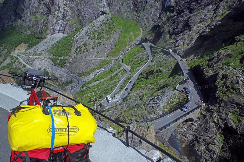 Packed bicycle on a mountain road with serpentines