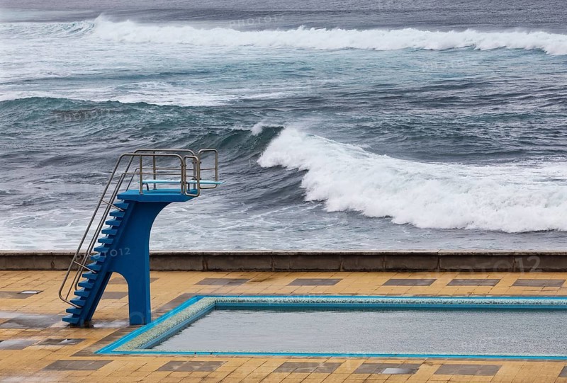 Swimming pool with diving tower on the Atlantic coast