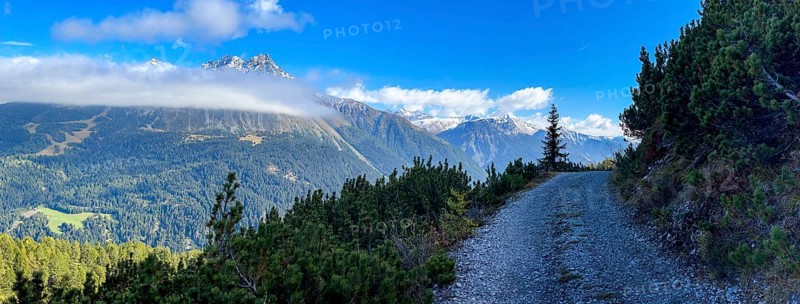 Fog band and prominent debris flow channel at Klopaierspitze