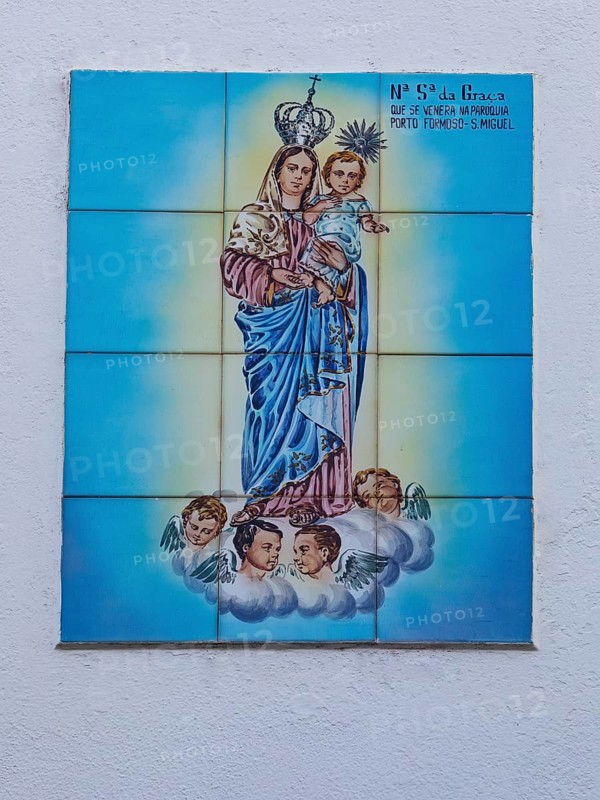 Typical Portuguese tile painting with saint motifs at the house entrances