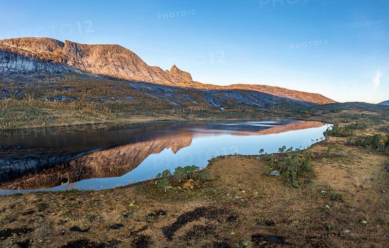 Mount Kulhornet reflected in small pond