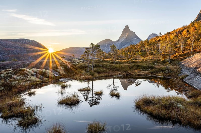 Stetind reflected in small pond