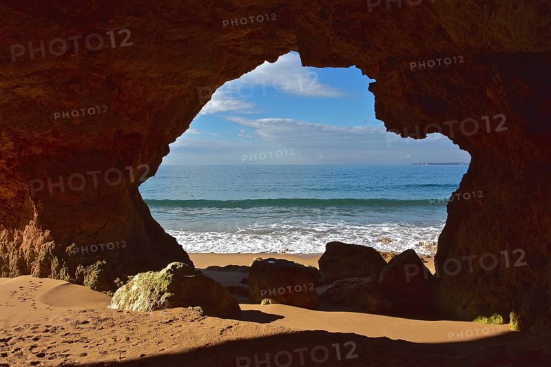 View of the sea through a rock window