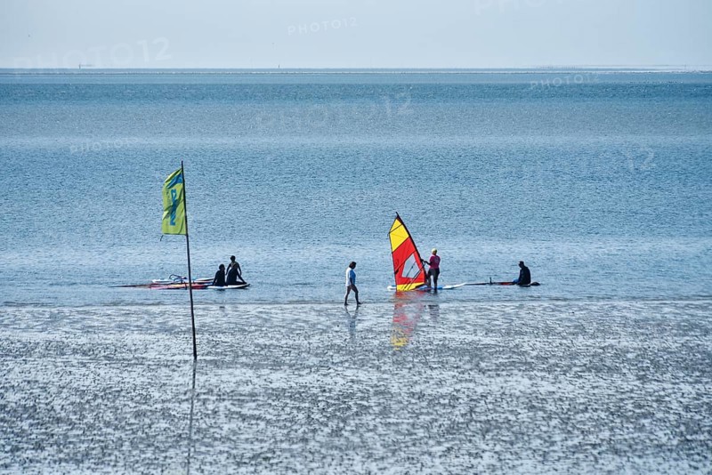 People on the edge of the Wadden Sea