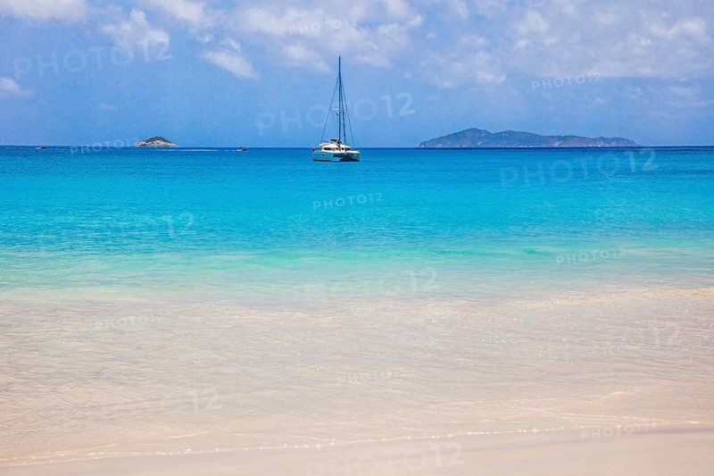 Dream beach with sailboat