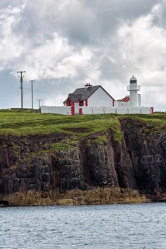 White Lighthouse on High Cliffs